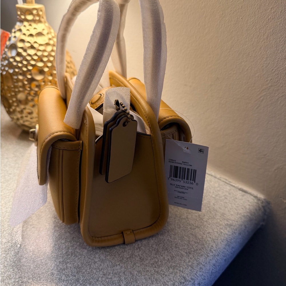 The Coach Originals Glovetanned Leather Mini Safari Tote - mustard/yellow - Picture 4 of 14